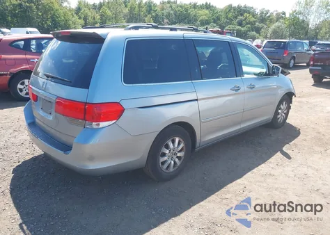 2010 Honda Odyssey Ex z USA, uszkodzony, nr VIN 5FNRL3H48AB038702